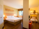 Кровать или кровати в номере Hotel Ibis Samui Bophut