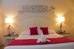 Кровать или кровати в номере Catalonia Punta Cana - Все включено