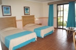 Кровать или кровати в номере Hotel Brisas Guardalavaca