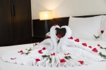 Кровать или кровати в номере Edele Hotel
