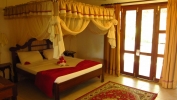 Кровать или кровати в номере Karafuu Beach Resort & Spa