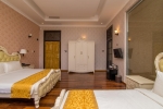 Кровать или кровати в номере Hotel Kabalana