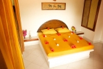 Кровать или кровати в номере Hotel Eva Lanka