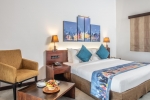 Кровать или кровати в номере Amethyst Resort Passikudah
