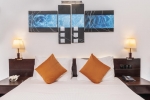 Кровать или кровати в номере Amethyst Resort Passikudah