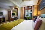 Кровать или кровати в номере Avani Kalutara Resort