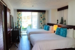 Кровать или кровати в номере Grand Paradise Playa Dorada - All Inclusive