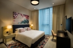 Кровать или кровати в номере Millennium Al Barsha