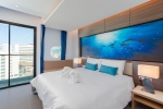 Кровать или кровати в номере The Marina Phuket Hotel