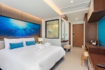 Кровать или кровати в номере The Marina Phuket Hotel