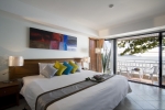 Кровать или кровати в номере Sunset Beach Resort