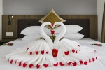Кровать или кровати в номере Diamond Nhatrang Hotel
