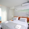 Кровать или кровати в номере Atrium Ambiance Hotel