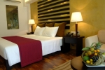 Кровать или кровати в номере Avani Bentota Resort