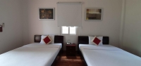 Кровать или кровати в номере Homestead Phu Quoc Resort (Paradise Resort Phu Quoc)