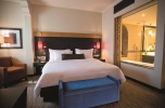 Кровать или кровати в номере Mövenpick Hotel Ibn Battuta Gate