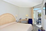 Кровать или кровати в номере Hotel Troya