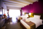 Кровать или кровати в номере Natural Park Resort Pattaya