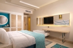 Кровать или кровати в номере Gravity Sahl Hasheesh
