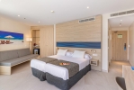 Кровать или кровати в номере Hotel Samos
