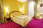 Кровать или кровати в номере Admiral Art Hotel