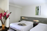 Кровать или кровати в номере Hotel Village Scoglio Della Galea