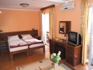 Кровать или кровати в номере Apartments Oaza 1