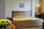 Кровать или кровати в номере Strandzha Hotel - Free Parking