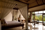 Кровать или кровати в номере The Payogan Villa Resort and Spa