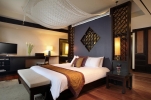 Кровать или кровати в номере Dusit Thani Pool Villa