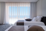 Кровать или кровати в номере Lighthouse Golf & Spa Hotel