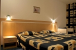 Кровать или кровати в номере Aqua Azur Hotel