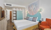 Кровать или кровати в номере Sol Katmandu Park & Resort