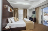 Кровать или кровати в номере Amorgos Boutique Hotel