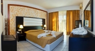 Кровать или кровати в номере Gaia Royal