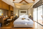 Кровать или кровати в номере Angsana Villas Resort Phuket
