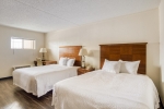 Кровать или кровати в номере OYO Hotel San Antonio Lackland Air Force Base North