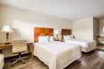 Кровать или кровати в номере OYO Hotel San Antonio Lackland Air Force Base North