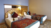 Кровать или кровати в номере Royal Holiday Palace