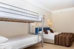 Двухъярусная кровать или двухъярусные кровати в номере Champion Holiday Village