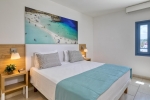 Кровать или кровати в номере Nausicaa Beach