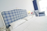 Кровать или кровати в номере Atlantique Holiday Club - All Inclusive