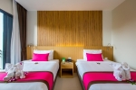 Кровать или кровати в номере Nai Yang Beach Resort and Spa