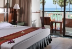 Кровать или кровати в номере Karon Princess Hotel