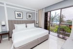 Кровать или кровати в номере Sugar Marina Resort - ART - Karon Beach