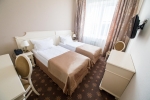 Кровать или кровати в номере Санаторий Альфа Радон