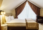 Кровать или кровати в номере Ислочь-Парк