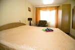 Кровать или кровати в номере Санаторий на Минском Море