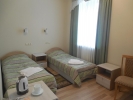 A bed or beds in a room at Krinitsa Health Resort