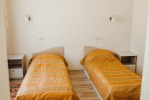 A bed or beds in a room at Krinitsa Health Resort